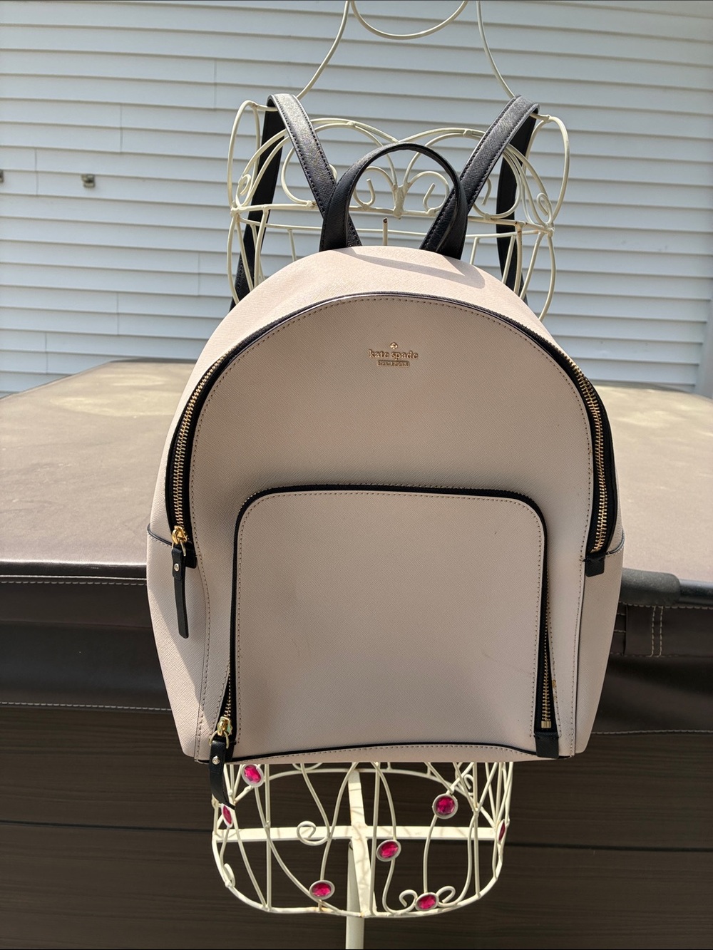 kate spade pale pink backpack with black trim saffiano leather